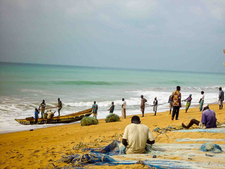 Fishermen on the beach, Togo