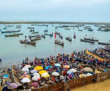 A view of a busy fishing harbor at accra
